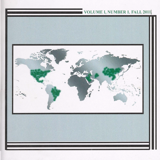 Cover image for Vol. 1, No. 1 of TJIA, showing a grey world map with green dots